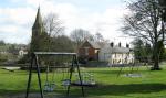 Image: Children's Play Area looking towards the Church and Pub